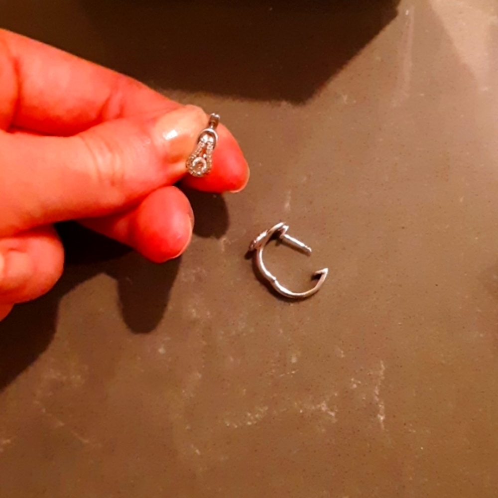 Diamond hoop earrings set in white gold